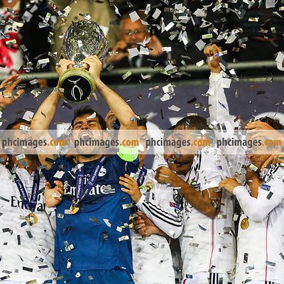 Real Madrid lift the Super Cup trophy