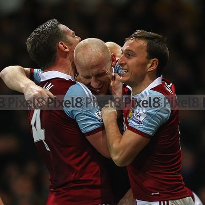 James Collins celebrates scoring West Ham's first goal with Nolan and Noble