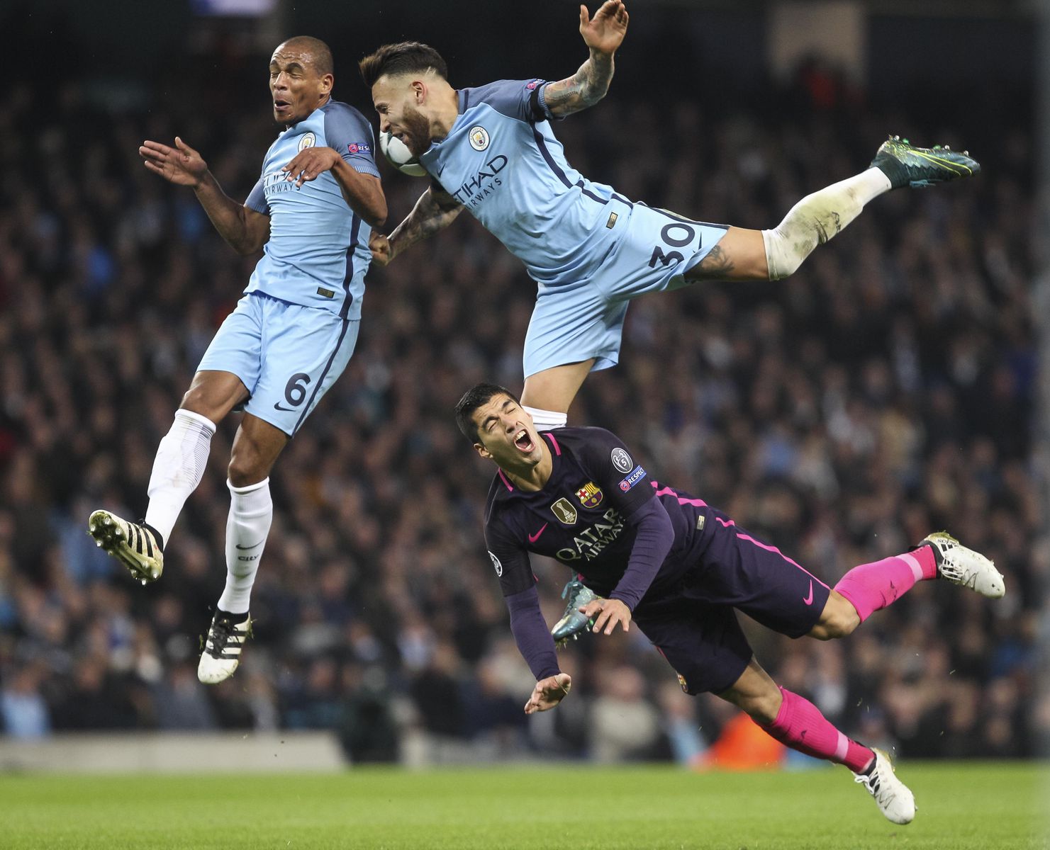 Fernando, Nicolas Otamendi and Luis Suarez clash during Manchester City’s Champions League win against Barcelona at the Etihad Stadium. (300mm, ISO2000, 1/1250th, f2.8)