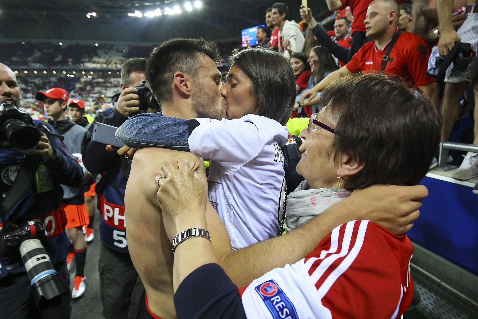 Ledian Memushaj of Albania celebrates with his family at full time