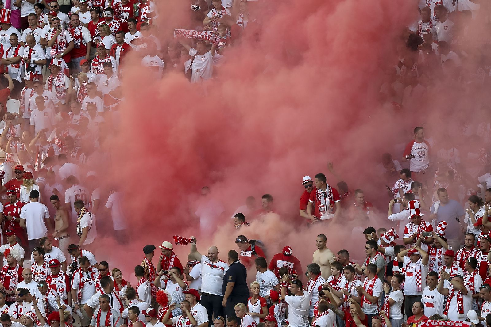 Poland fans let off a smoke flare
