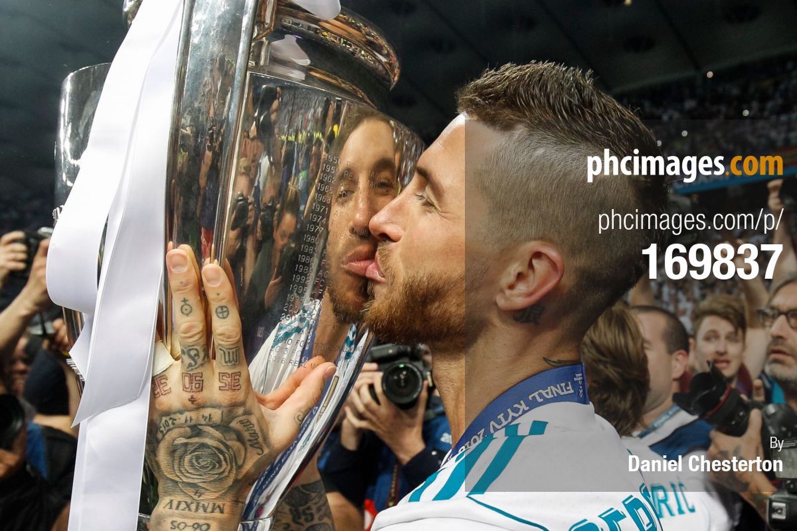 Sergio Ramos kisses the trophy after the Champions League Final