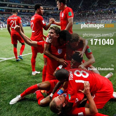 England celebrate their winner against Tunisia