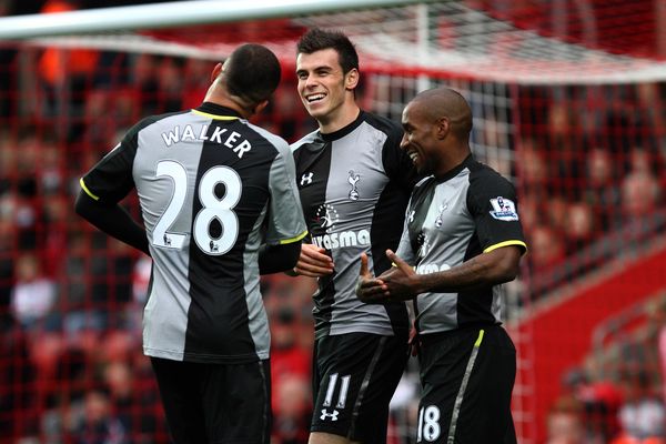 Gareth Bale celebrates a goal against Southampton with Jermain Defoe and Kyle Walker
