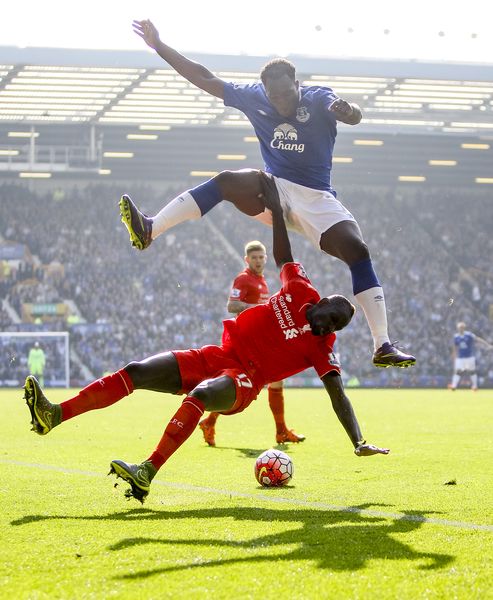 Mamadou Sakho and Romelu Lukaku compete for the ball during the Merseyside derby