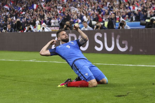 Olivier Giroud celebrates after scoring against Iceland