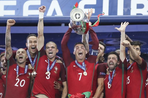 Cristiano Ronaldo of Portugal lifts the Euro 2016 trophy