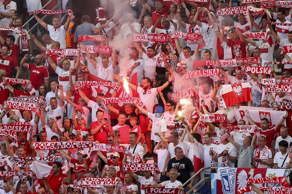 Poland fans let off flares
