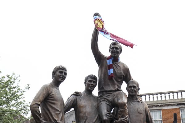 The World Cup winners statue is decorated before the last match