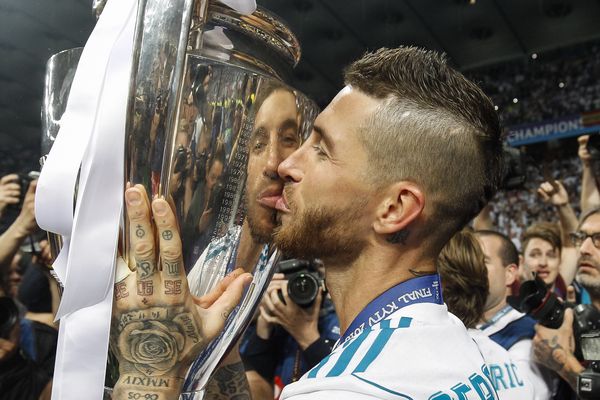 Sergio Ramos of Real Madrid kisses the trophy after winning the UEFA Champions League final against Liverpool
