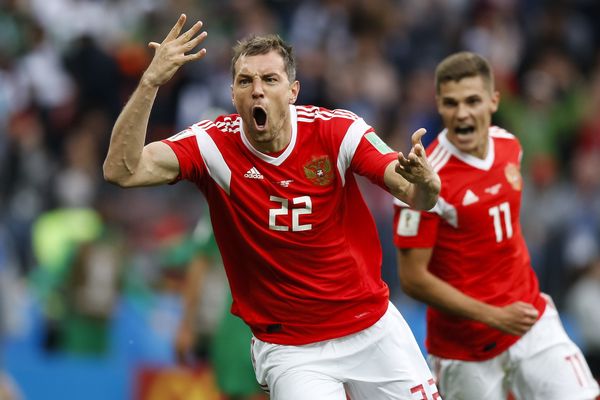 Artem Dzyuba of Russia celebrates after scoring his side's third goal against Saudi Arabia