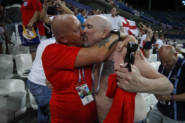 England fans kiss each other England beat Tunisia