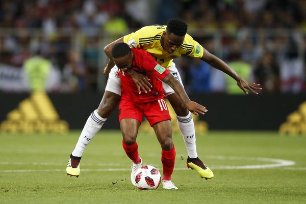 Raheem Sterling is fouled by Colombia's Yerry Mina
