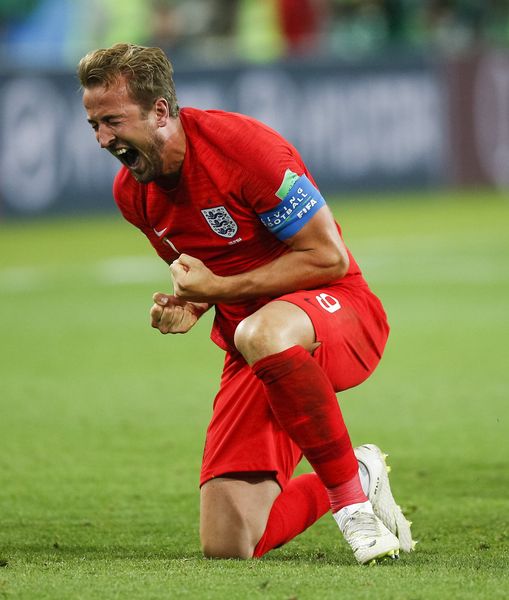 Harry Kane celebrates after beating Colombia