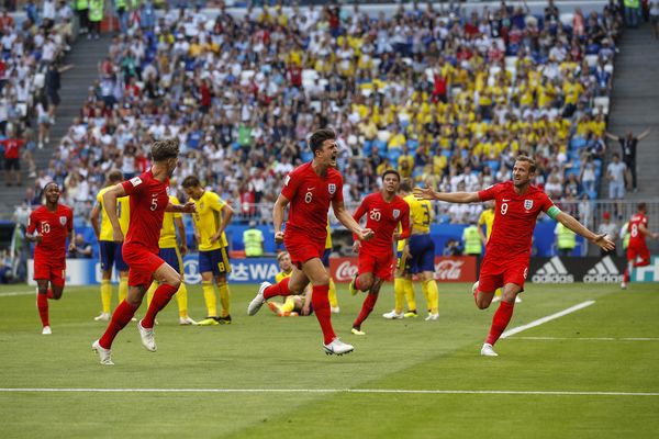 Harry Maguire of England celebrates after scoring against Sweden