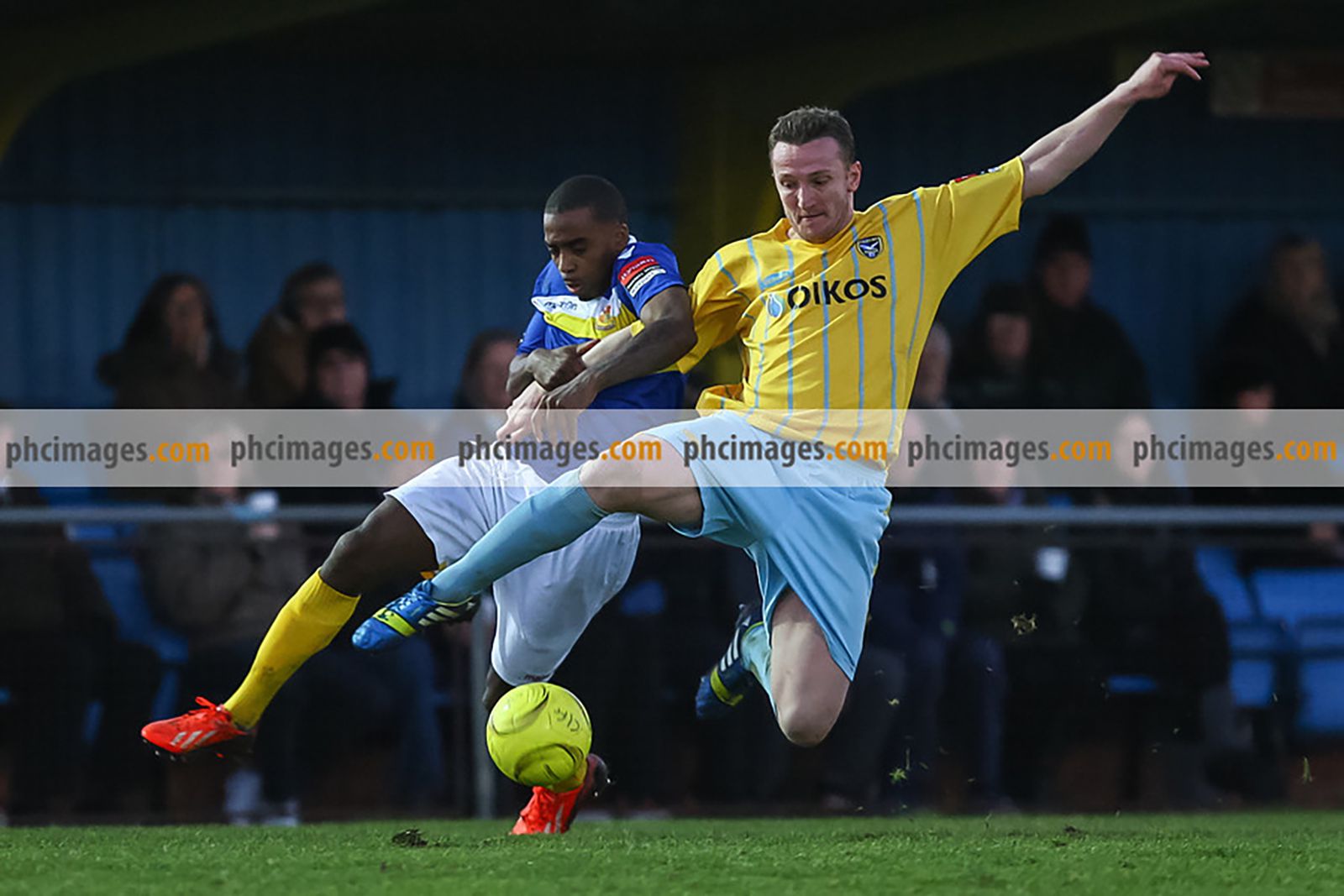 Wealdstone’s Michael Malcolm and Canvey’s match winner Nicky Humphrey compete for the ball