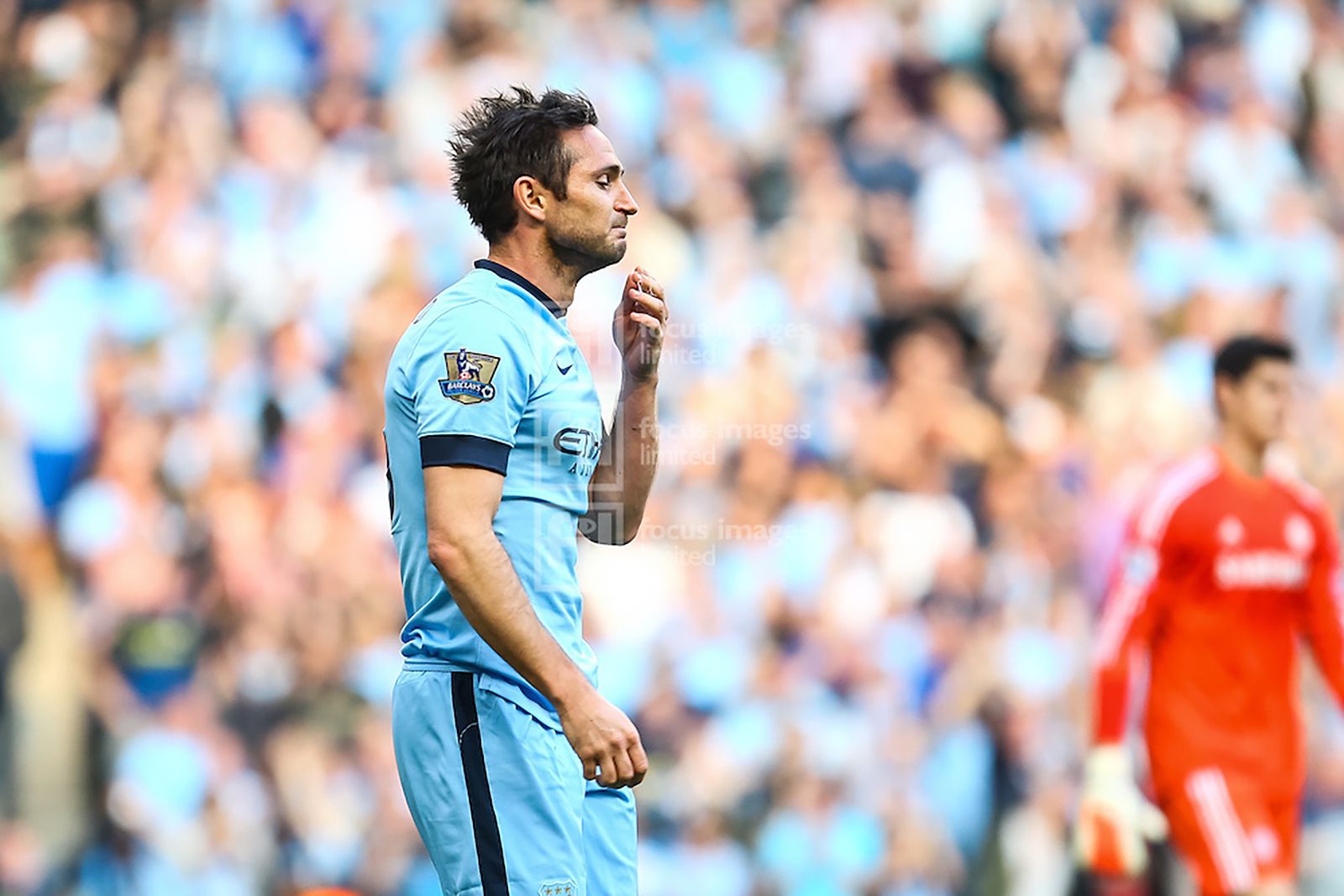 Lampard looks unsure how to react after scoring against Chelsea