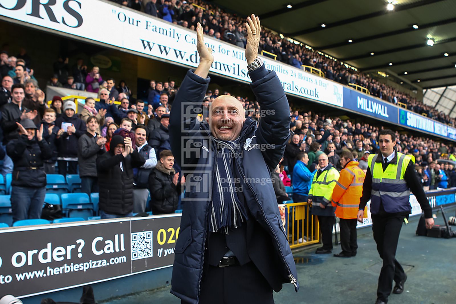 Ian Holloway applauds the Millwall fans before the match