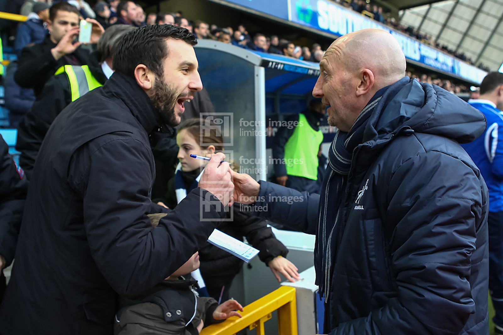 Ian Holloway greets Millwall fans before the match