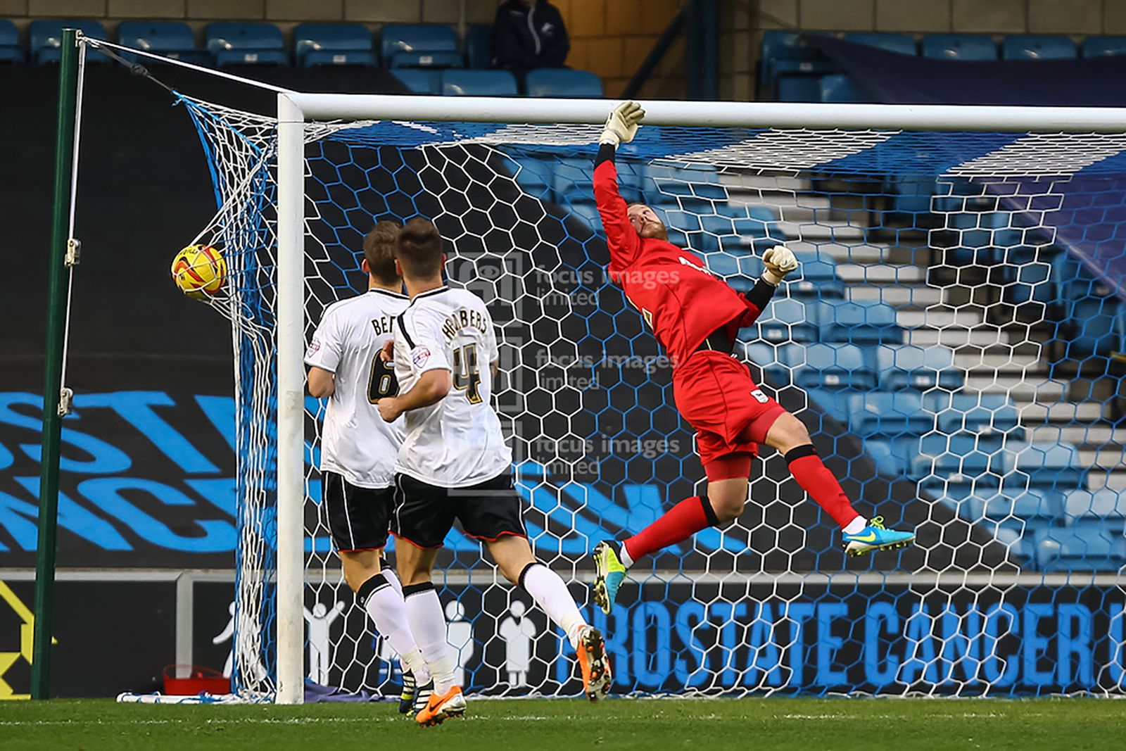 Ryan Fredericks of Millwall’s fluke shot loops over Dean Gerken in the Ipswich goal for the only goal of the game