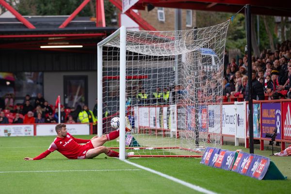 Matt Butcher of Accrington Stanley clears the ball off the line against Portsmouth