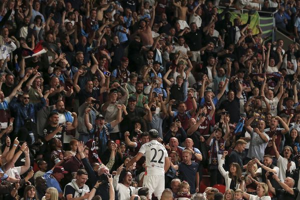 Said Benrahma celebrates with fans after scoring from the penalty spot