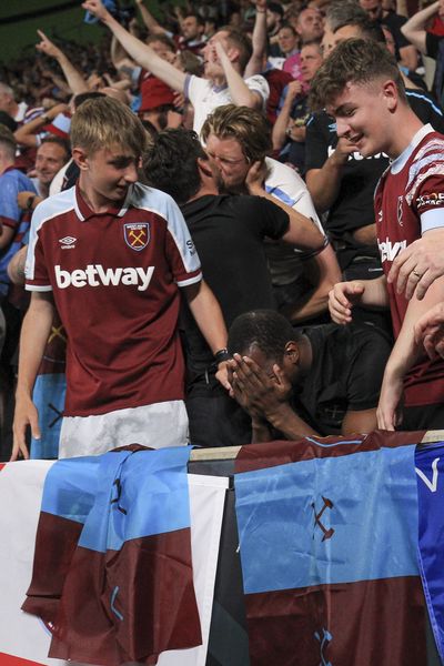 West Ham fans react after the winning goal late on