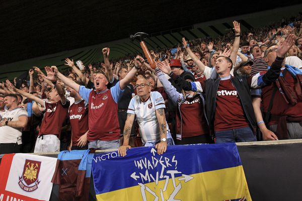 West Ham fans react after the winning goal late on