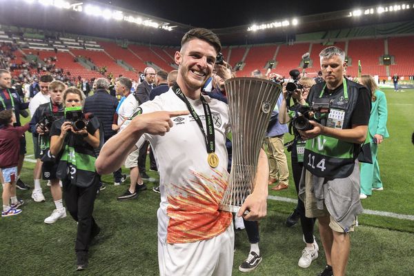 Declan Rice celebrates with the trophy